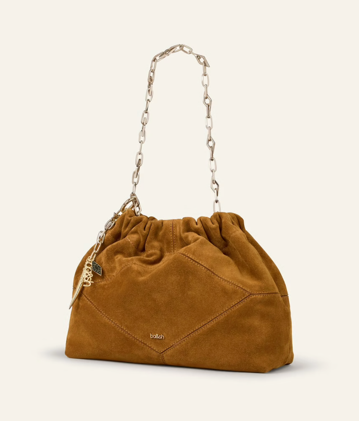 deep tan suede small bucket style bag with bag charm from ba&sh side view
