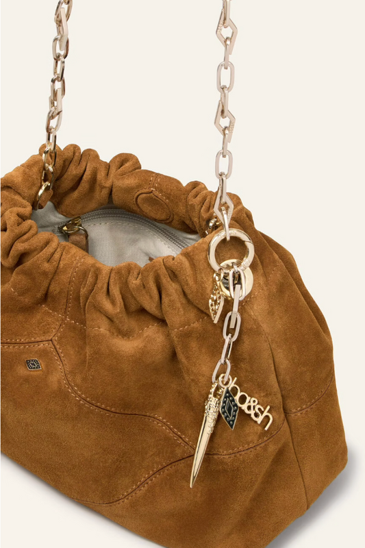 deep tan suede small bucket style bag with bag charm from ba&sh inside view