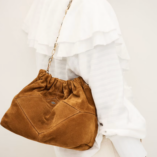 deep tan suede small bucket style bag with bag charm from ba&sh model shot