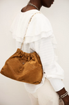 deep tan suede small bucket style bag with bag charm from ba&sh model shot