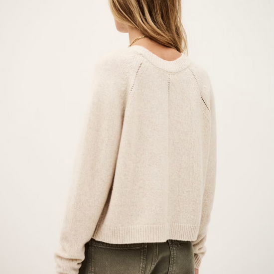 beige v neck wool mix cardigan with 3 gold buttons, rib detailing and a boxy fit from ba&sh rear view