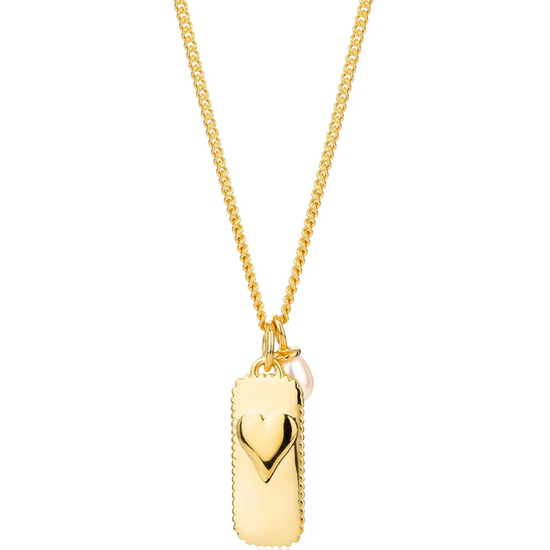 rectangular gold pendant with heart on one side and glimmer written on the other with pearl from claudia bradby