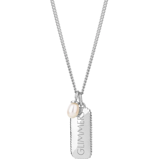 silver rectangular pendant necklace with heart on one side and glimmers on the reverse form claudia bradby
