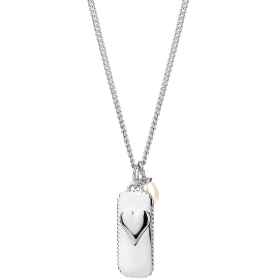 silver rectangular pendant necklace with heart on one side and glimmers on the reverse form claudia bradby on reverse