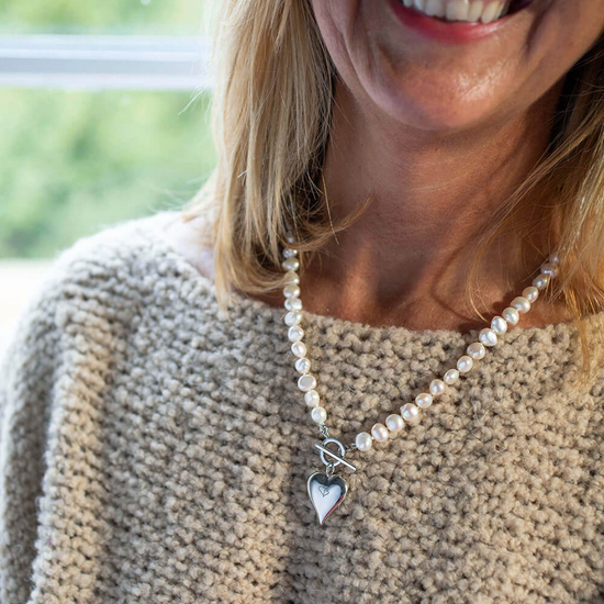 pearl toggle necklace with silver heart from claudia bradby model shot