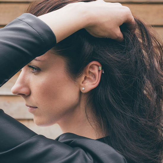small pearl stud earrings from claudia bradby model shot