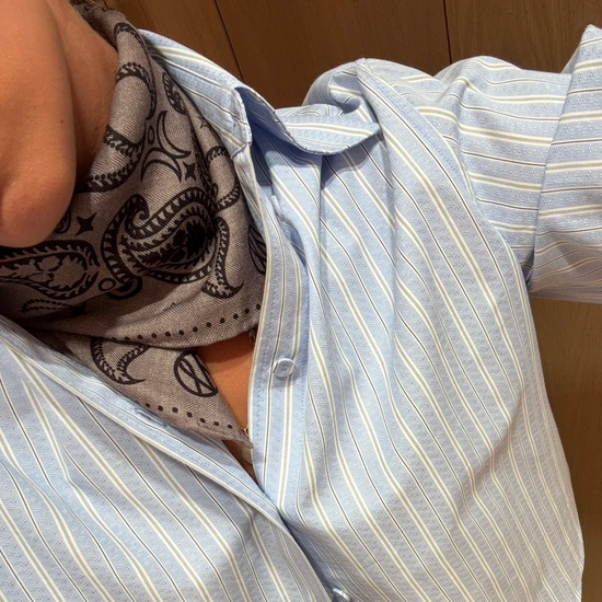 taupe wool mix square scarf with paisley detail in burgundy on one side and black the other from lescarf model shot