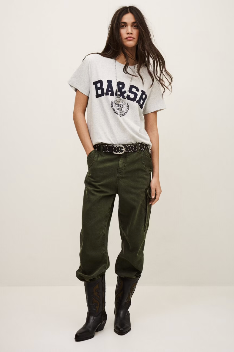 short sleeve light grey t shirt with dark navy bash on the front model