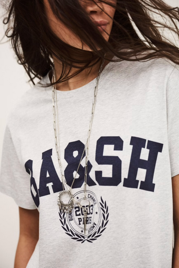 short sleeve light grey t shirt with dark navy bash on the front close up