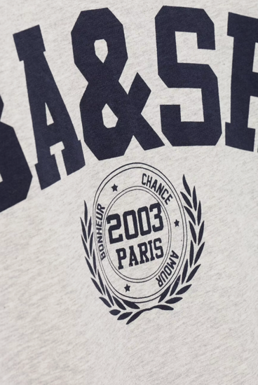 short sleeve light grey t shirt with dark navy bash on the front close up