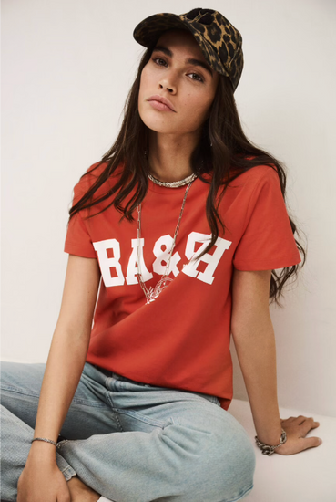 ned tshirt with white bash on the front  model