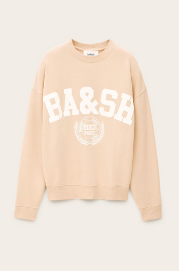 light pink long sleeve sweatshirt with white bash on the front
