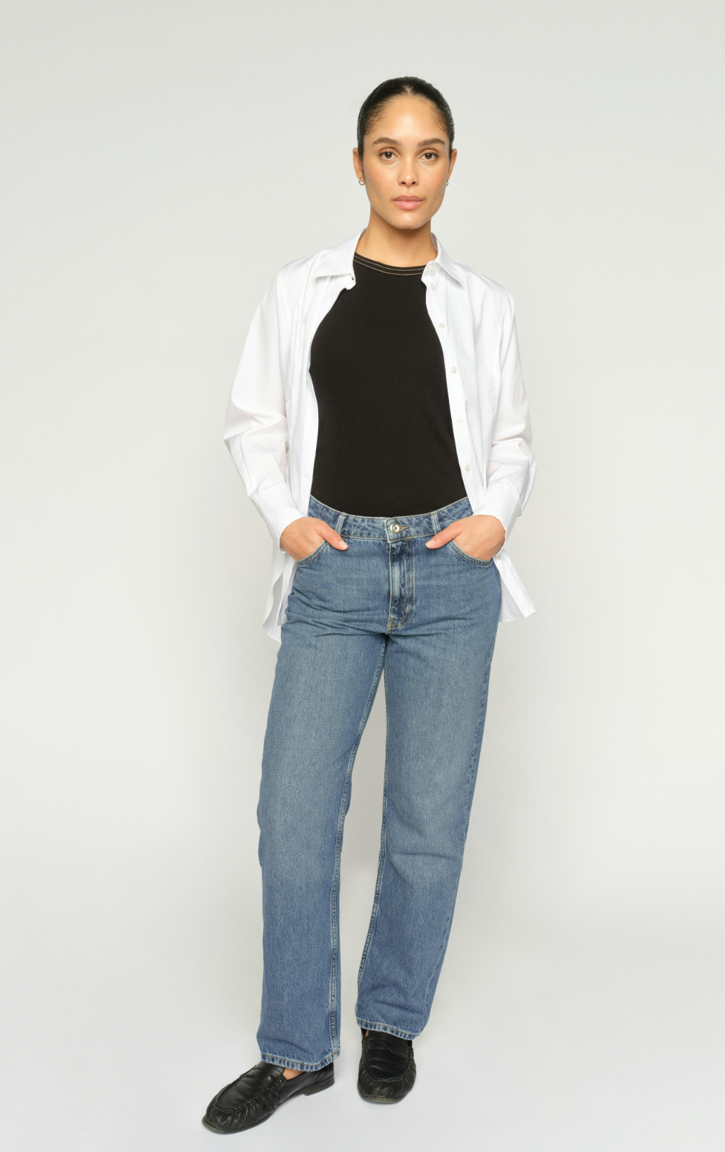 light blue denim straight leg jeans  model