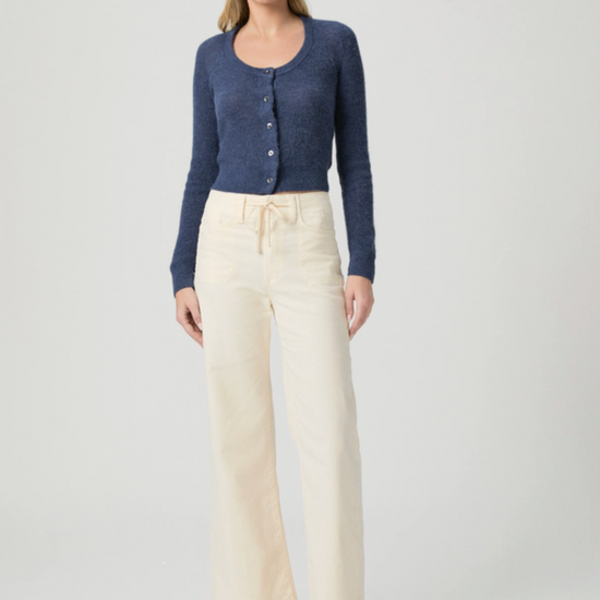 cream jeans with drawstring on a model on a white background