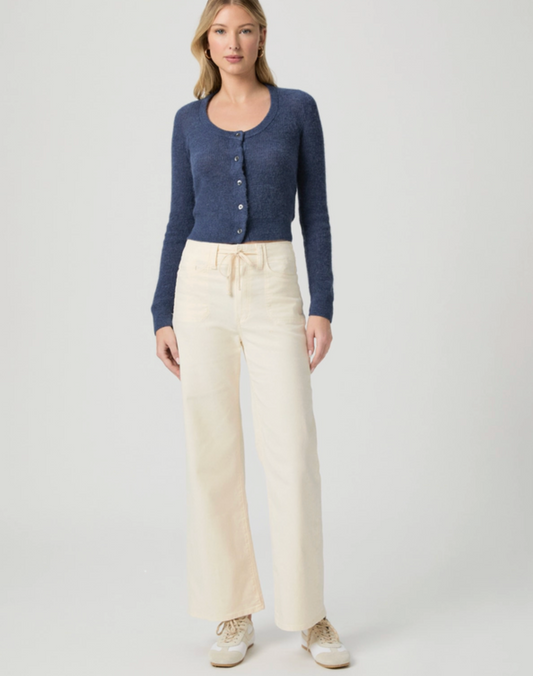 cream jeans with drawstring on a model on a white background