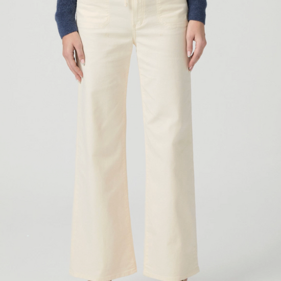 cream jeans with drawstring on a model on a white background