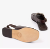 the bottom of a sandal on a white background