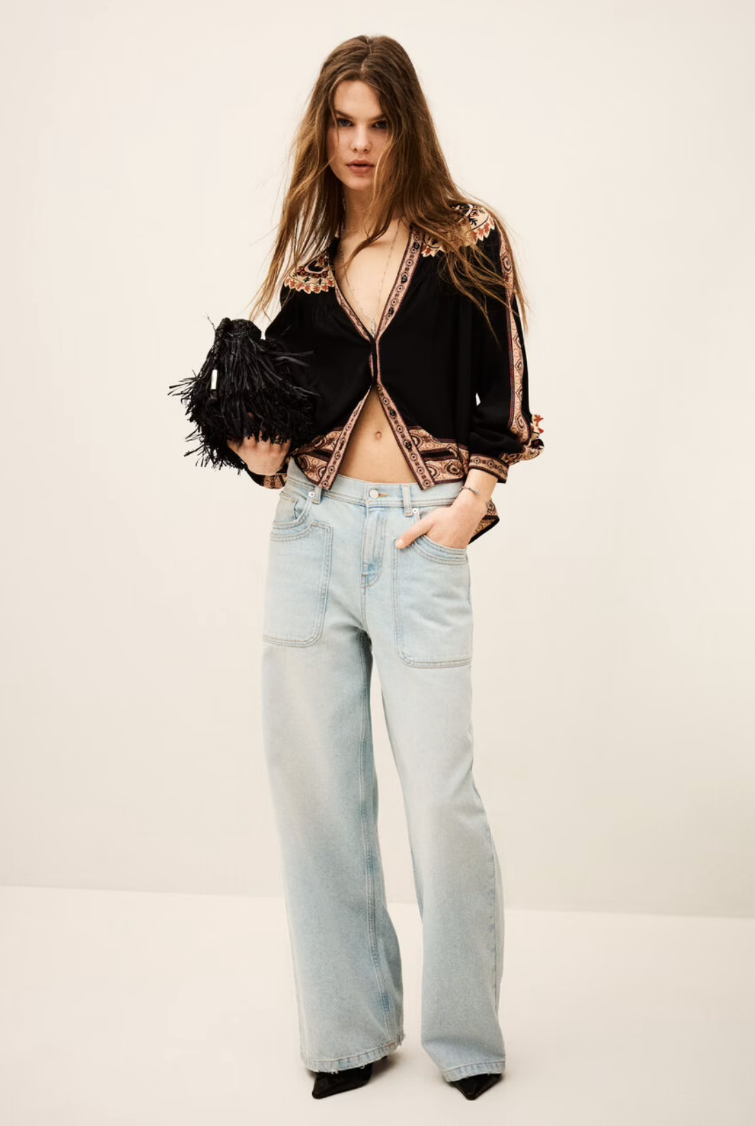 dark brown button down blouse with colourful paisley print from bash model 