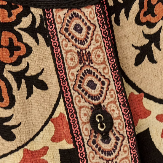 dark brown button down blouse with colourful paisley print from bash close up of fabric