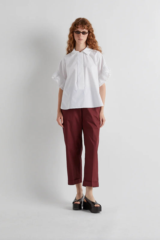 White shirt with pleated shoulder detail