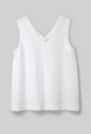 white v neck top on a light grey background