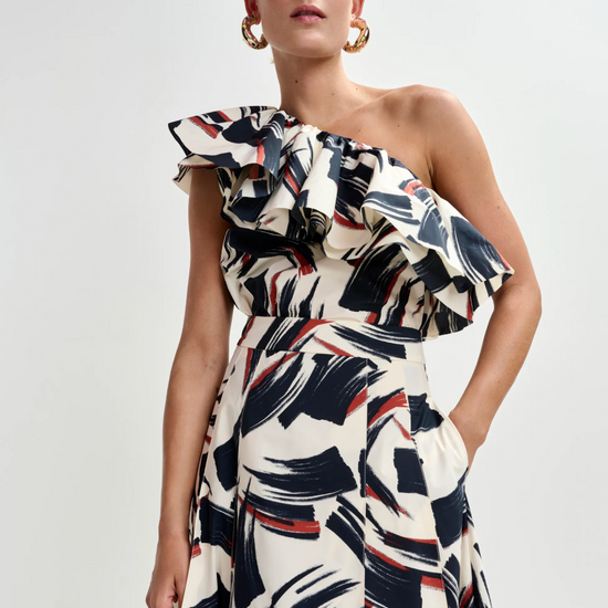 One shoulder print top worn with matching skirt