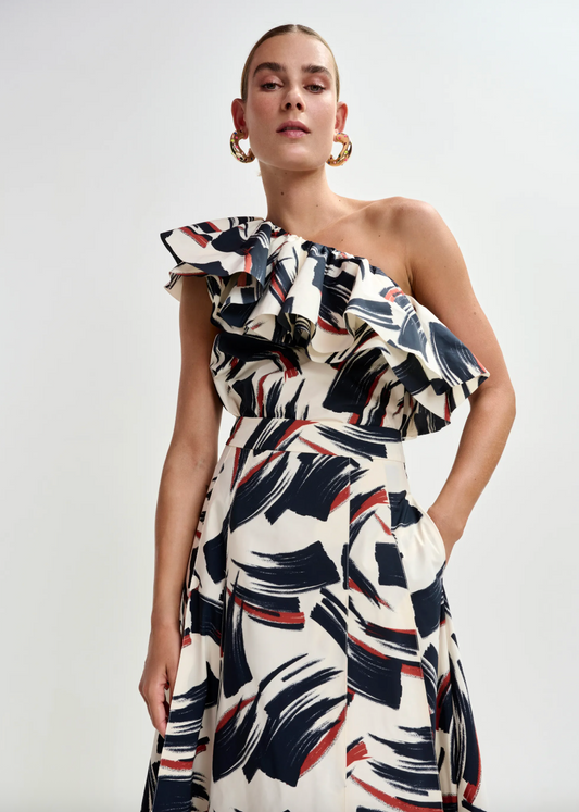 One shoulder print top worn with matching skirt