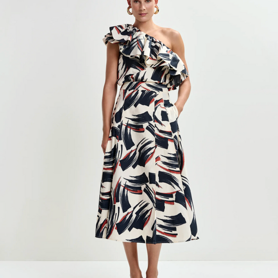 One shoulder top worn with matching skirt