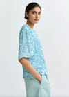 Short sleeve pale blue sequin top