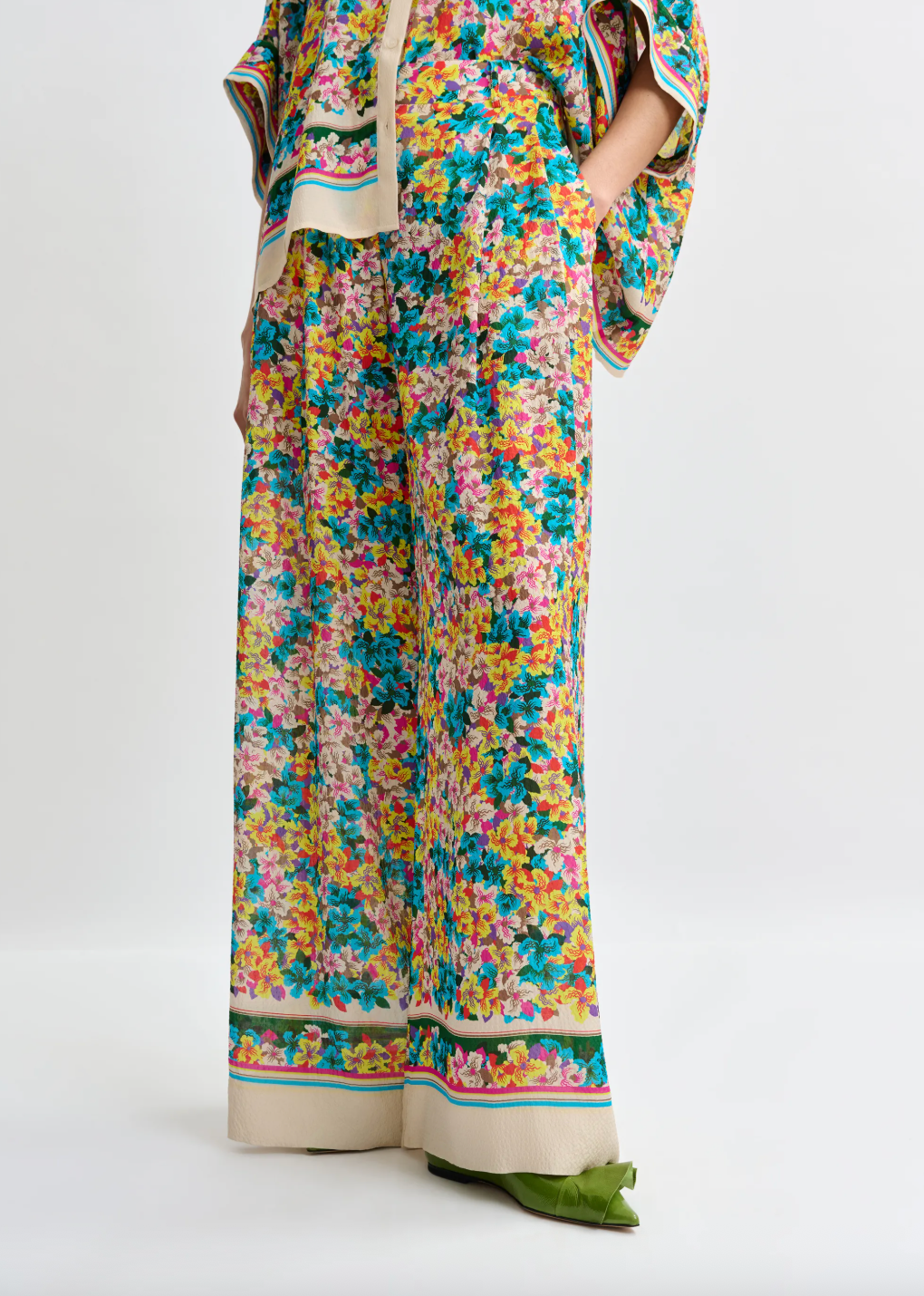 Colorful floral dress with a white background