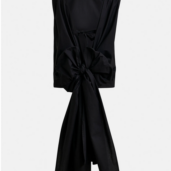 Black sleeveless dress with a knot detail on a white background