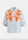 pale blue blouse with orange floral embroidery on a white background