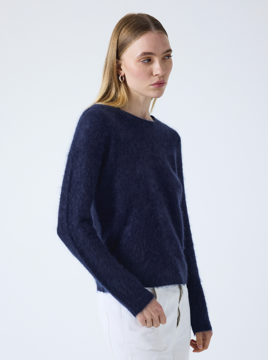 crew neck navy cashmere jumper with fluffy texture side 