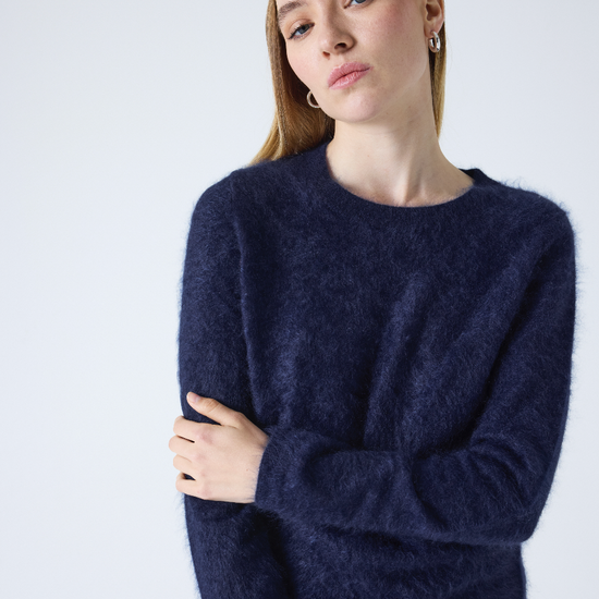 crew neck navy cashmere jumper with fluffy texture model shot
