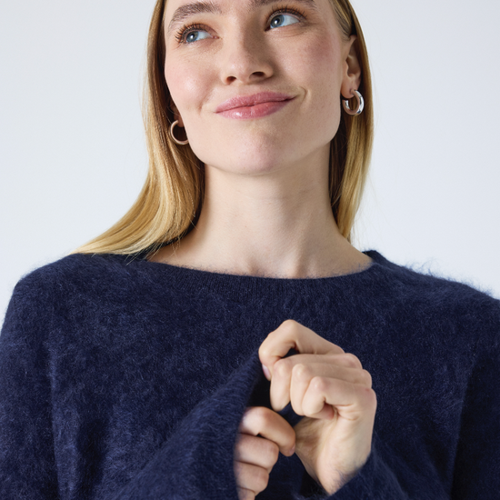 crew neck navy cashmere jumper with fluffy texture close up