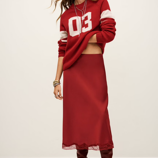 red polyester mid length skirt with lace trim and side zip from ba&sh model shot