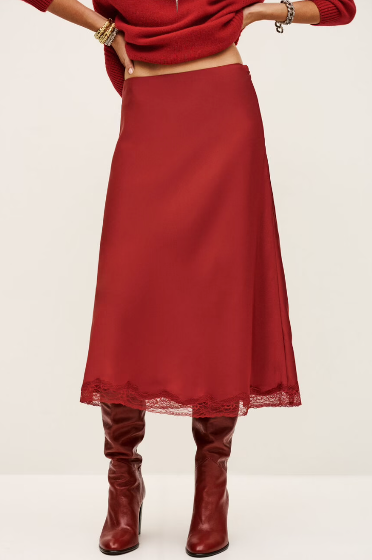 red polyester mid length skirt with lace trim and side zip from ba&sh model shot