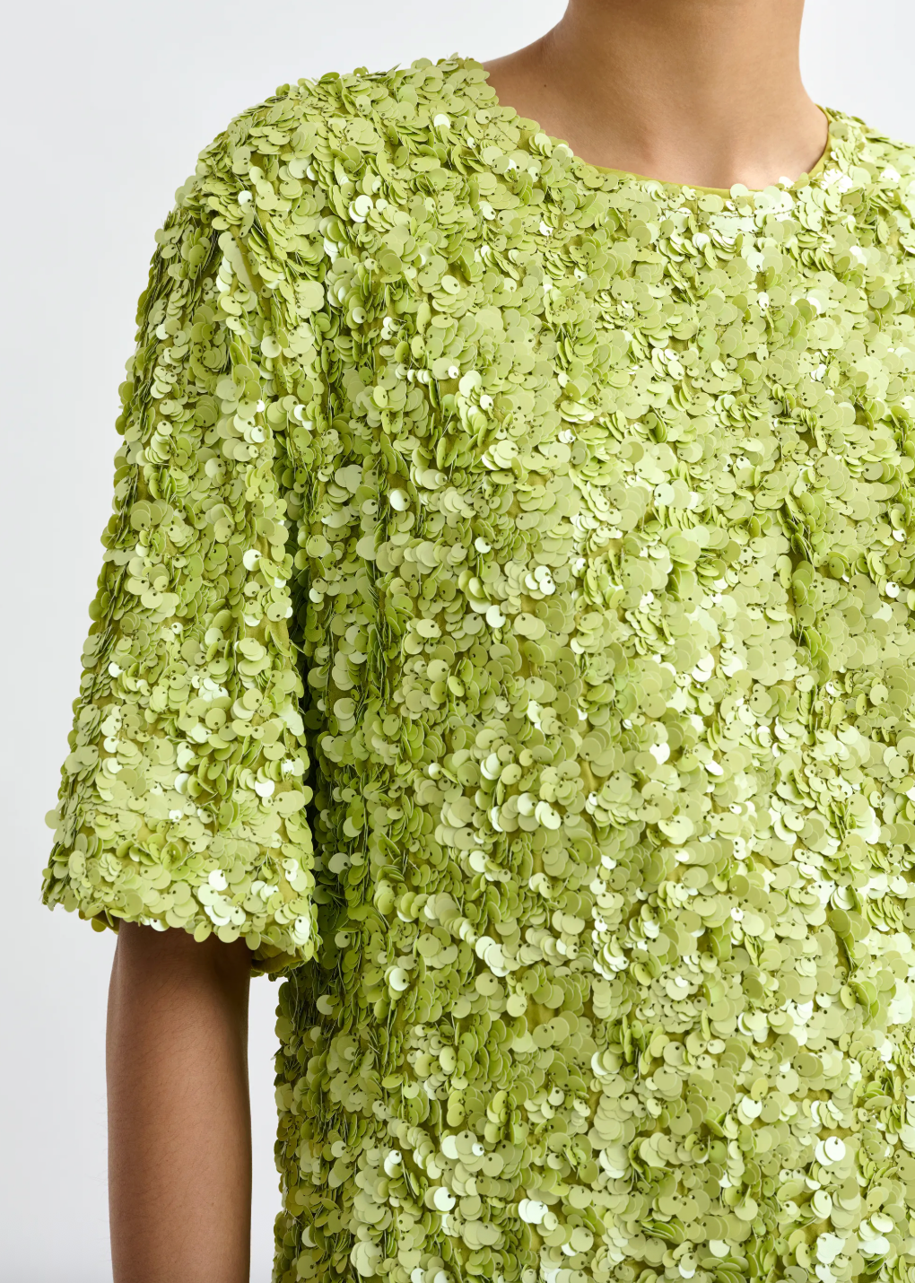 Close up of sequin detail of top