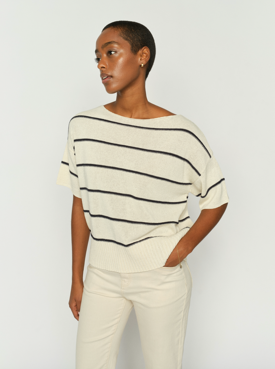 Ecru knit with black stripe with short sleeve worn with eru jeans from Mos Mosh