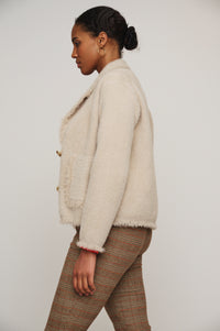 beige single breasted furry jacket side view 