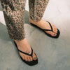 Square toe black rubber flip flops from sleepers model