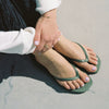 Square toe green rubber flip flops from sleepers model 