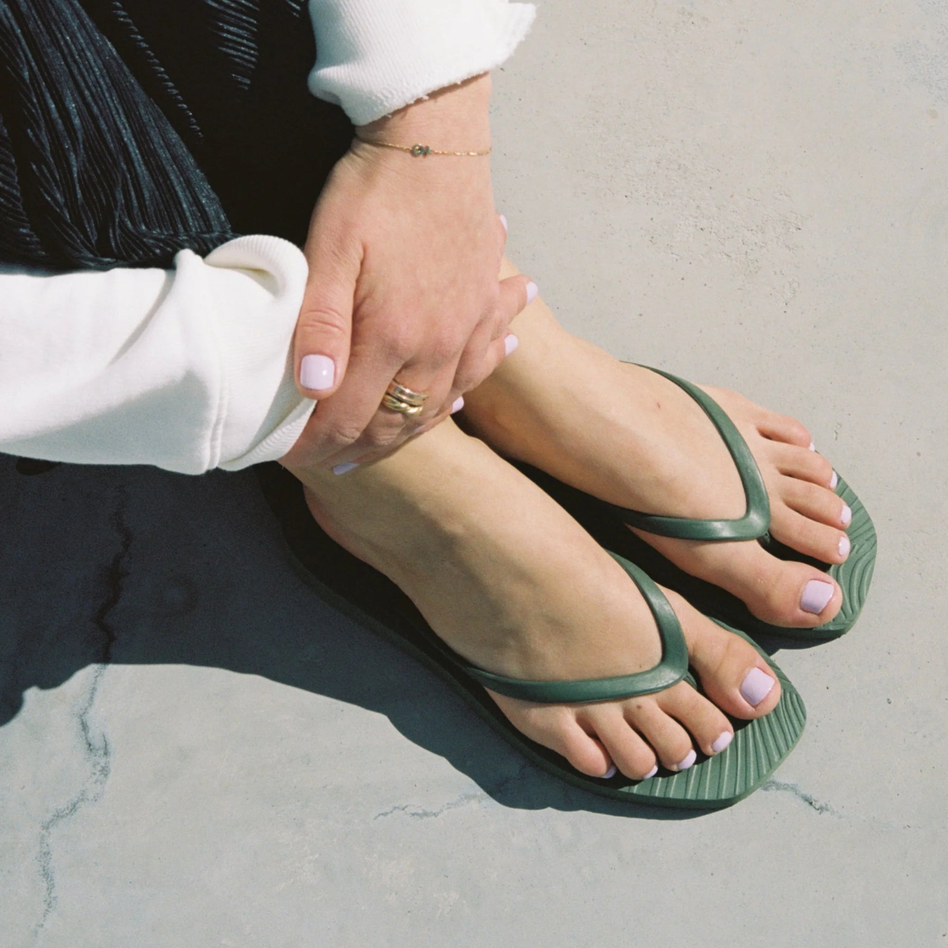 Square toe green rubber flip flops from sleepers model 