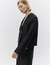 v neck black blazer with flared sleeves and single statement button from day birger side view