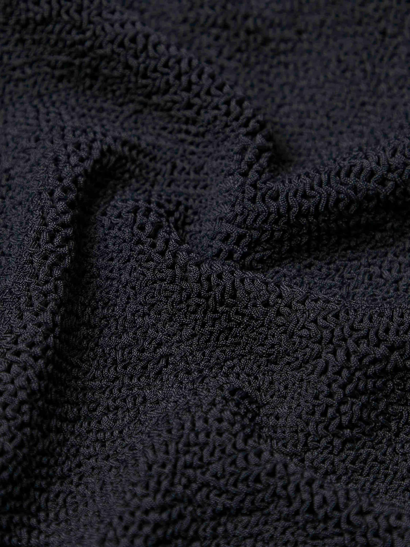 sqaure neck crinkle black swimsuit from hunza g close up of fabric