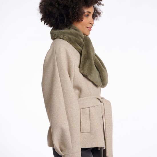 green long faux fur rectangular scarf with slit to enable to cross into itself side view 