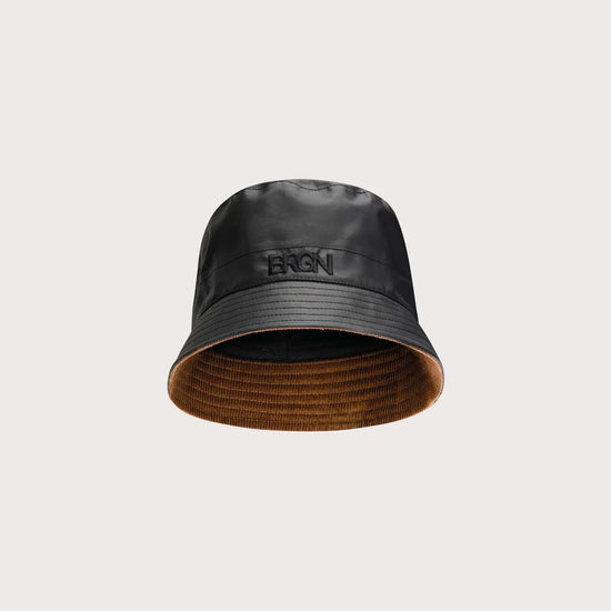 Black bucket hat on light grey background