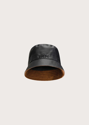 Black bucket hat on light grey background