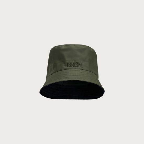 Dark Green bucket hat on light grey background
