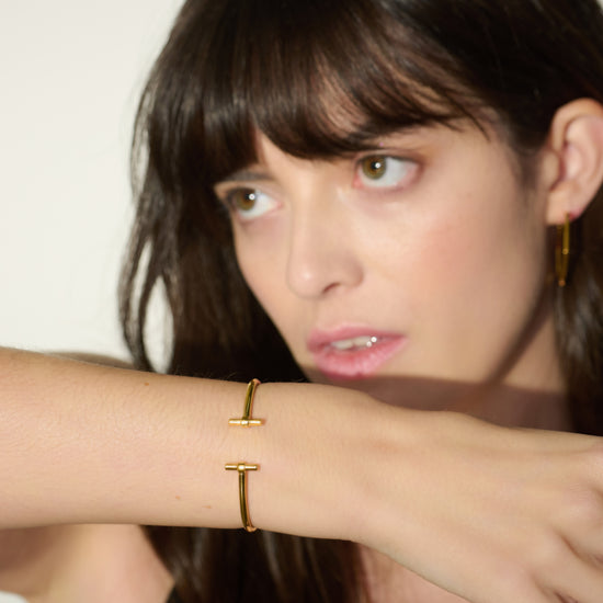 gold t bar adjustable bangle from rachel jackson model shot